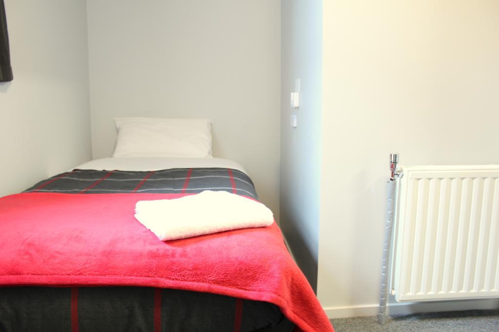 Urbanz Pansiyon Christchurch Oda fotoğraf A single room at the hotel